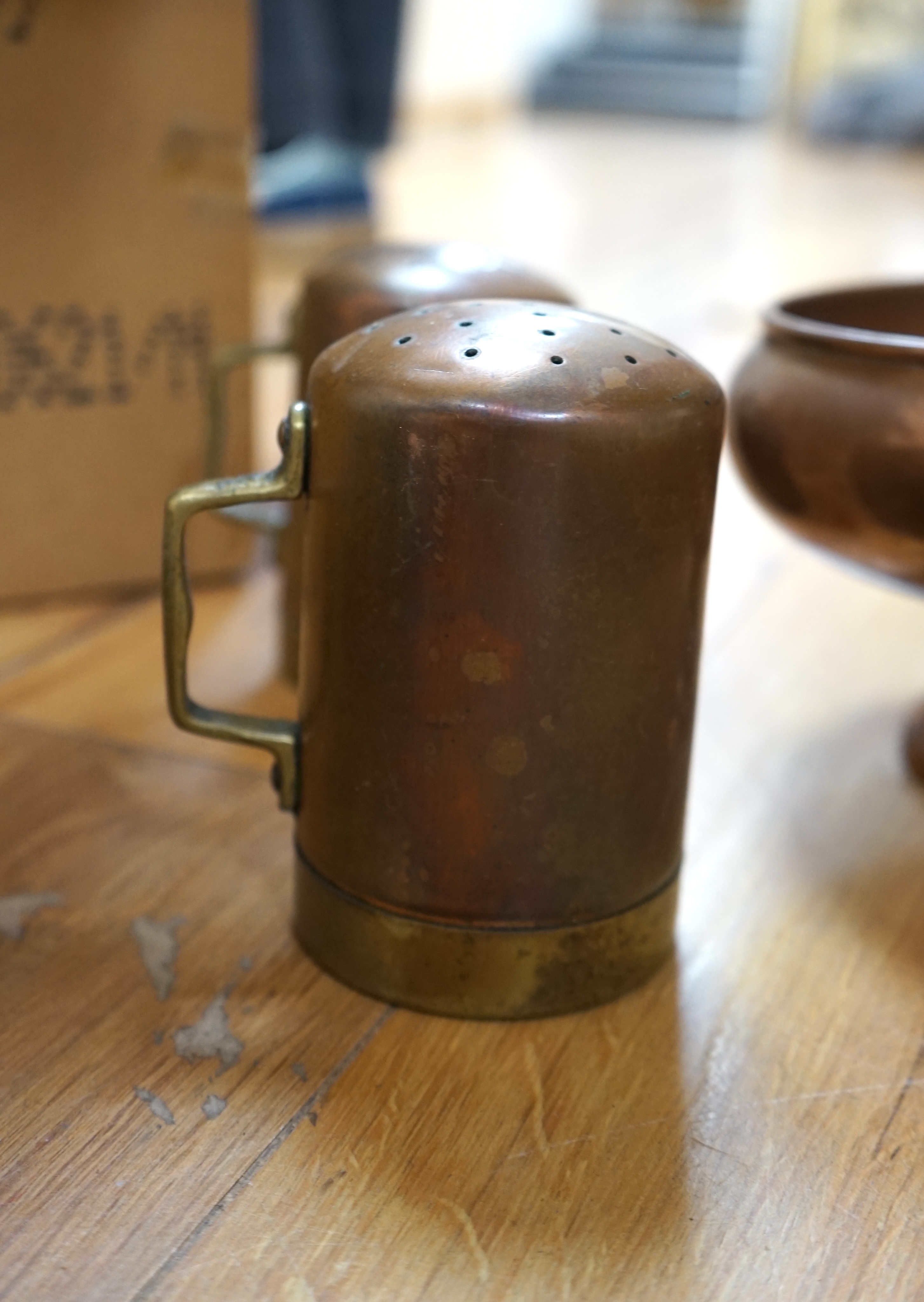 A quantity of Victorian and later copper and metalware to include horse brasses and a bugle. Condition - varies